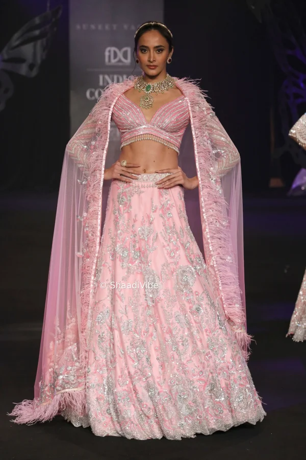 Powder Pink bridal lehenga featuring delicate embroidery with modern age power blue embroidery in thread work for a fresh and contemporary Indian bridal aesthetic.