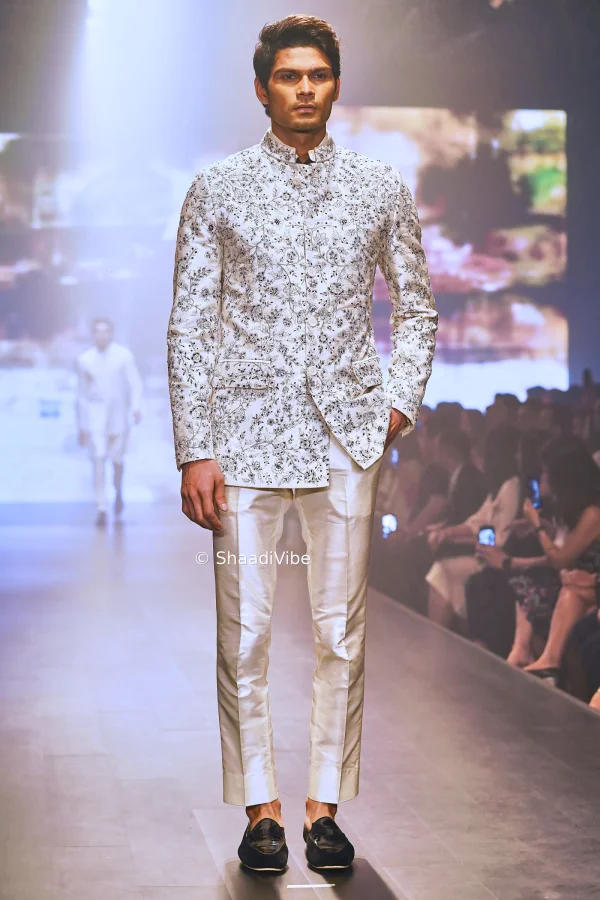 heavy embroidered jodhpuri top with straight pants.