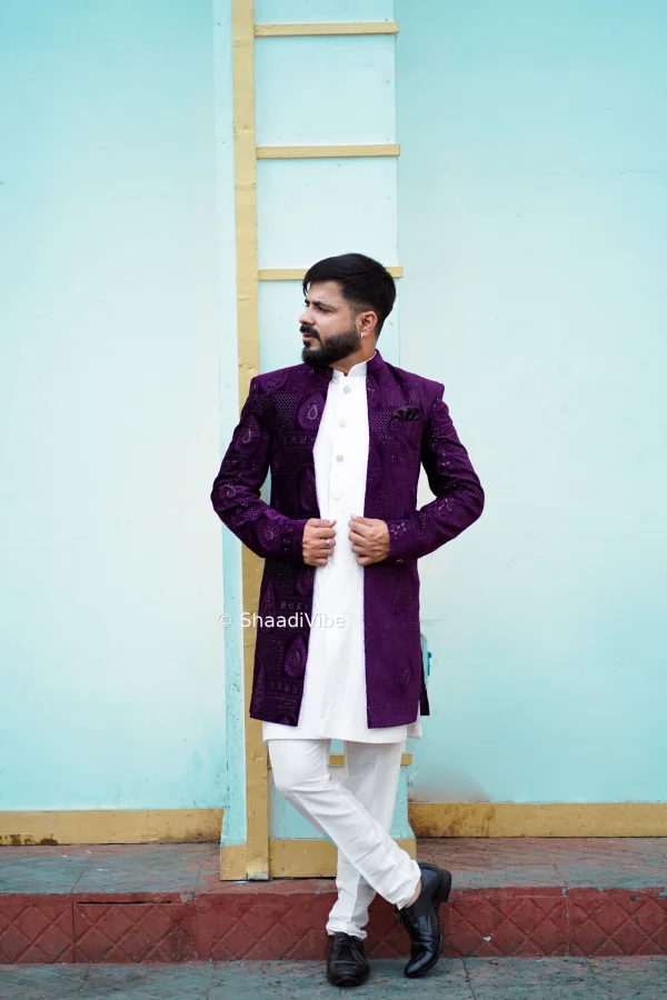 Elegant embroidered Nehru jacket styled with a kurta and trousers for a modern yet traditional groom look.