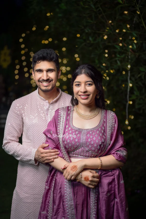 Elegant bride and groom portrait captured during the wedding ceremony, highlighting their traditional outfits and natural chemistry.