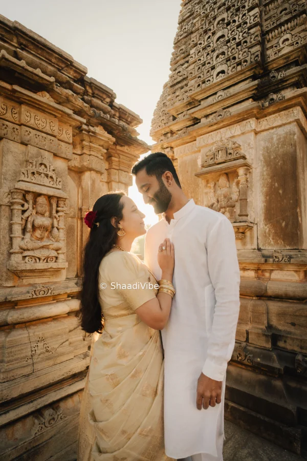 Intimate bride and groom portrait with the couple looking at each other during their pre wedding day for a romantic photograph.