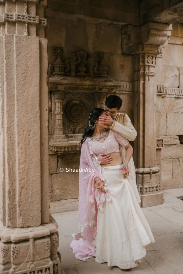 Dreamy pre-wedding couple portrait featuring the bride and groom standing close together against a scenic outdoor backdrop.