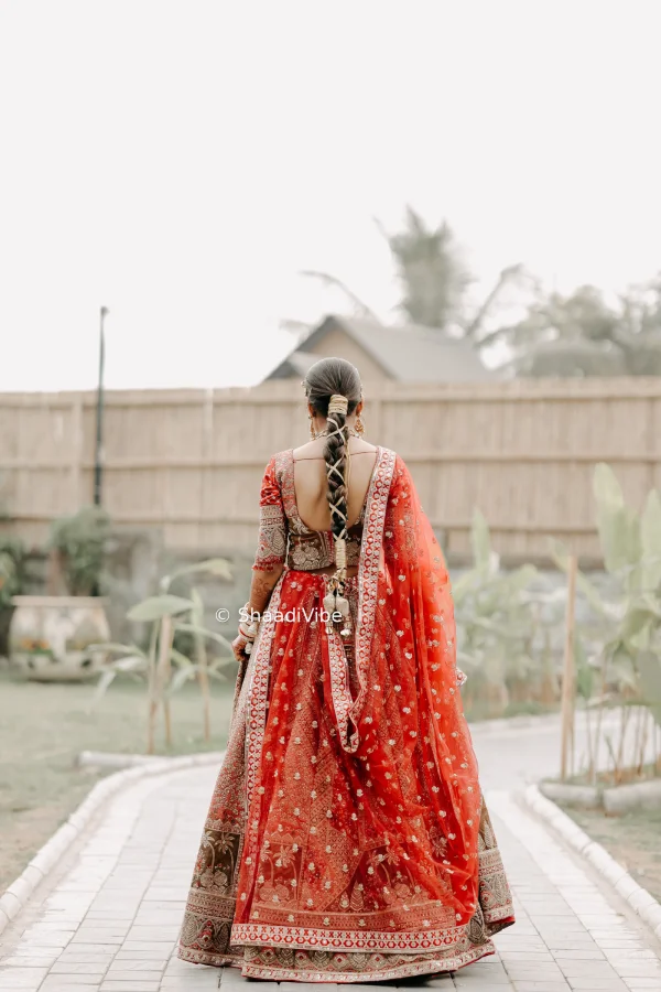 Long bridal braid styled with accessories for an elegant South Indian bridal look.